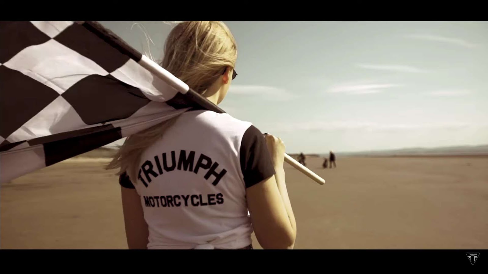 Close up of woman in triumph motorcycle T-shirt