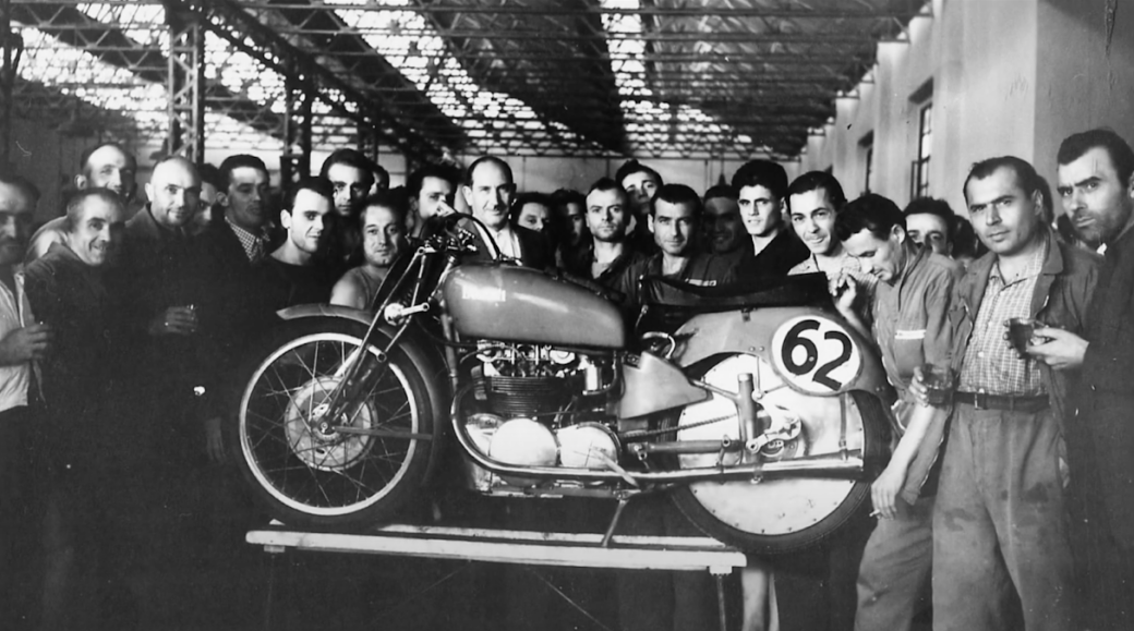 First Benelli motorcycle, working people around
